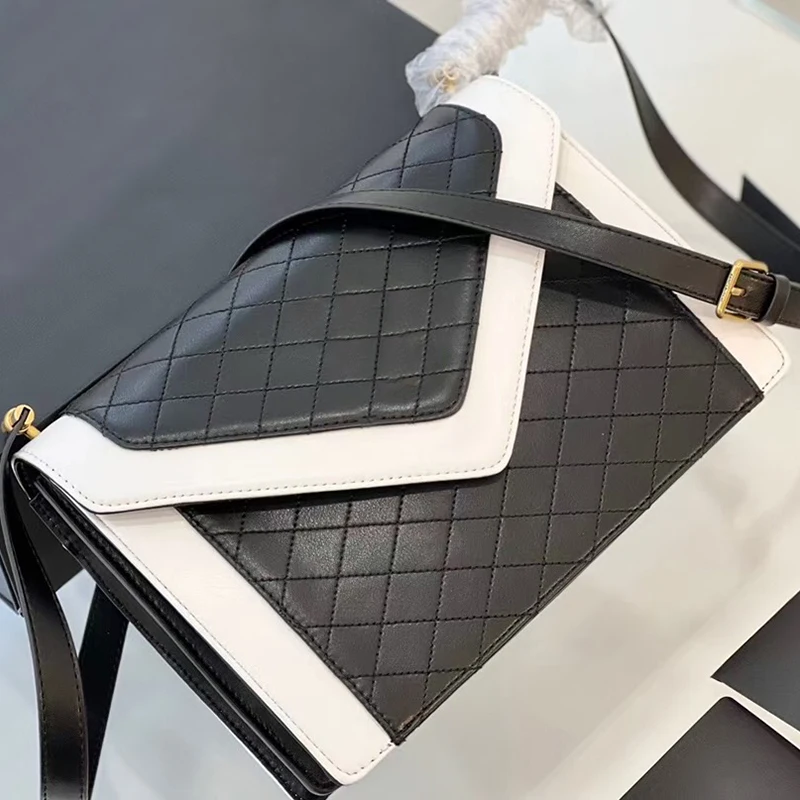 

The new diamond-shaped retro leather shoulder bag ladies envelope bag fashion hit color clamshell bag messenger bag