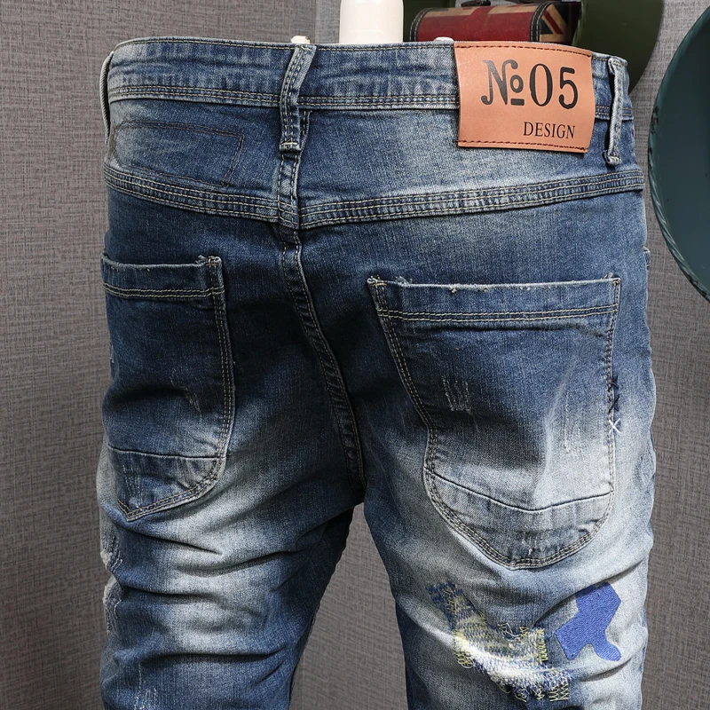 Fashion Streetwear Men Jeans Retro Blue Slim Fit Destroyed Ripped Jeans Men Embroidery Patch Designer Hip Hop Denim Pencil Pants