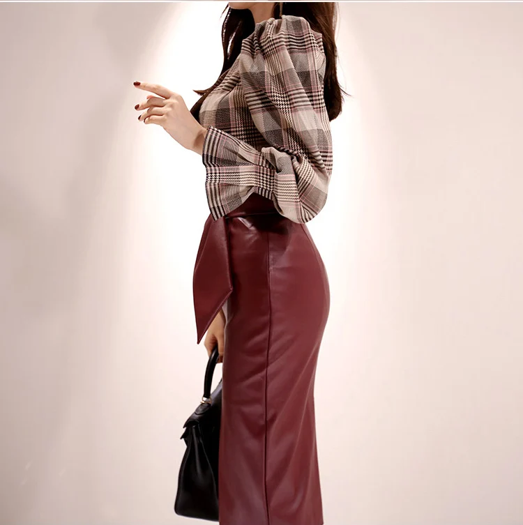 

Plaid 2019 autumn and winter new two-piece temperament goddess fan Slim top + PU bag hip skirt suit