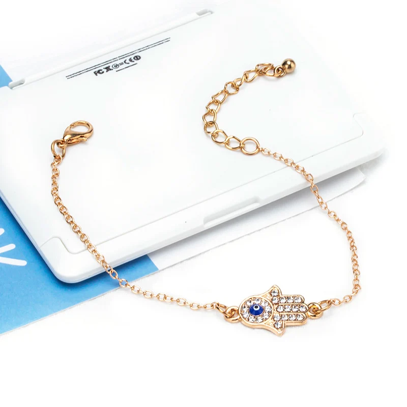 Женский браслет-цепочка с кристаллами подвеской глаз