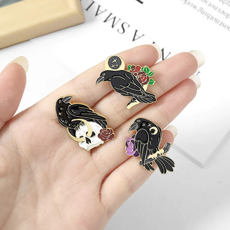 

Black bird brooch, rose flower crow brooch, paint enamel badge wholesale in stock, bag decoration, gift for friends