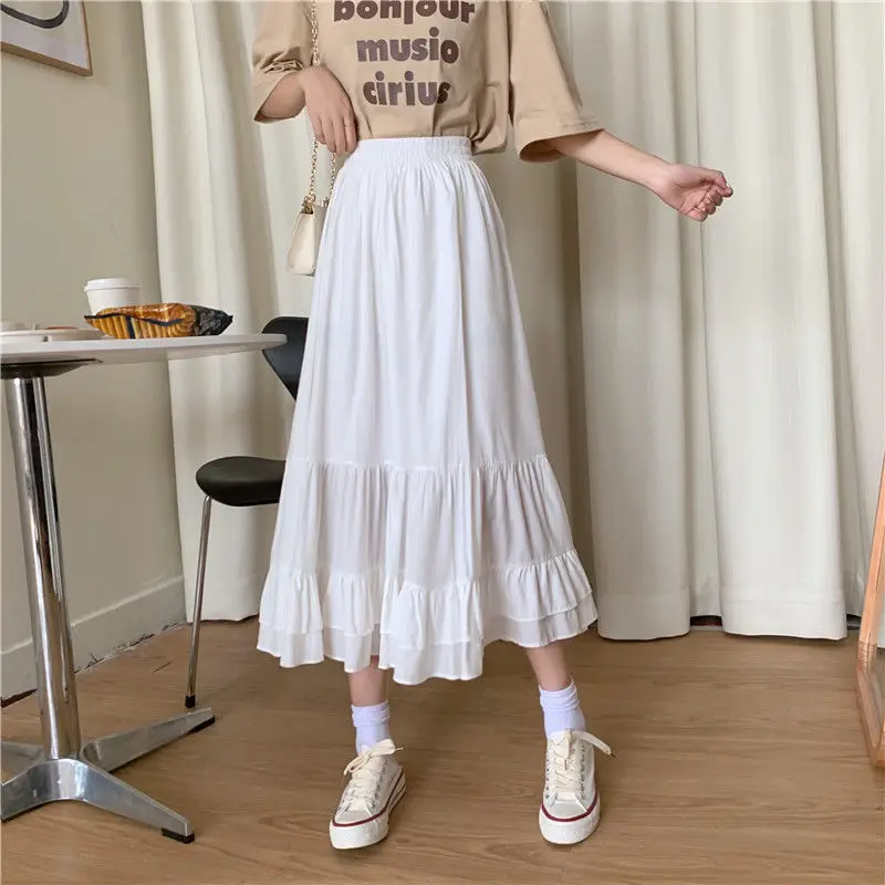 

Summer 2021 new girl's long skirt with lotus leaf, high waist and thin A-line skirt, solid color, loose and versatile skirt