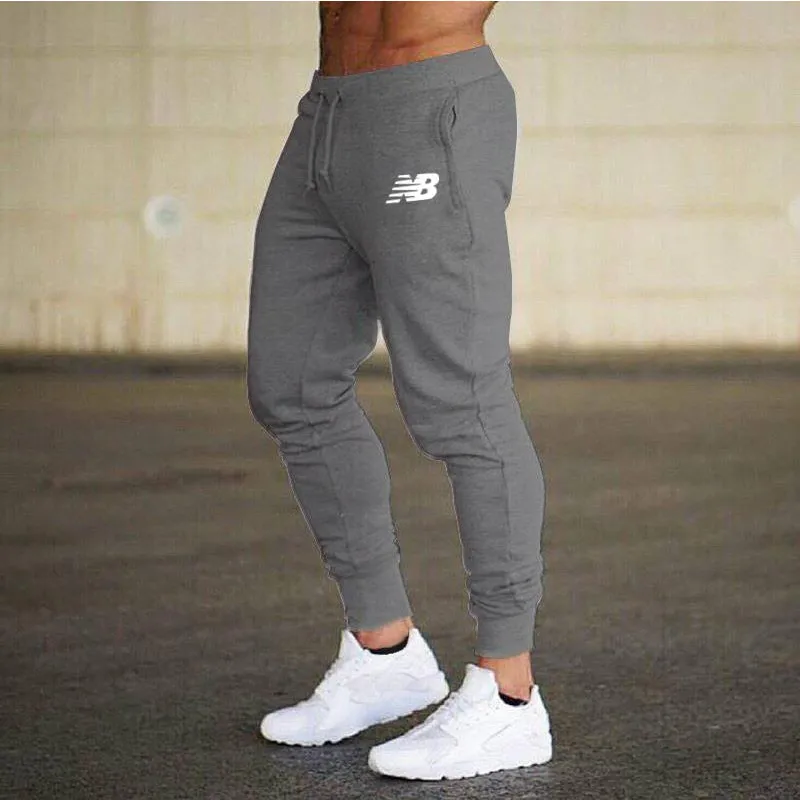 

High Quality Men's New Brand Polyester Sports Pants Casual Pants Daily Exercise Fitness Leisure Sports Jogging Pants