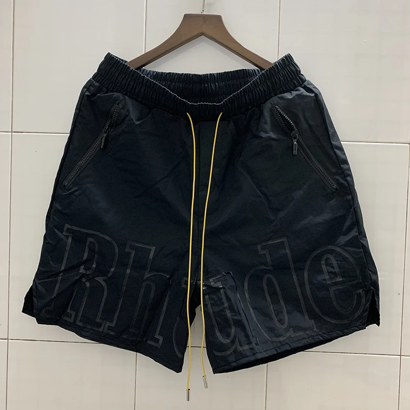 

2021ss Rhude Shorts Men Women 1:1 Best Quality Big Letter Logo Oversize Breechcloth Yellow drawstring Pill Zipper Head