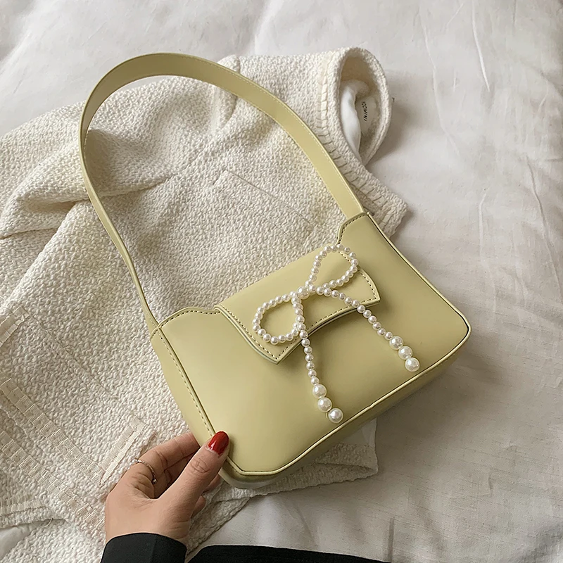 

Designer PU Leather Baguette Bag with Pearl Bow for Women 2021 Female Travel Fashion Solid Color Shoulder Purses and Handbags
