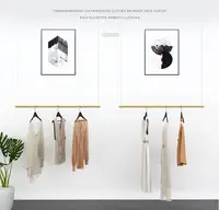 Clothing store display rack hanging on the wall clothing rack women's clothing store shelf hanging clothes rack hanging rod.
