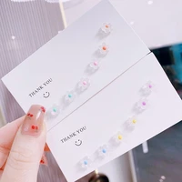the new 925 silver small ear raising small and fresh invisible flower ear stud set students simple girls small girls earring