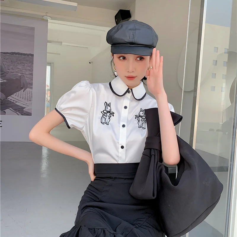 

Korejepo Women Blouse 2021 Summer New French Vintage Embroidered Rabbit Black White Color Matching Shirt Lapel Puff Sleeve Tops