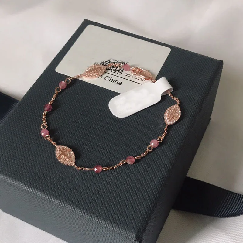 

Женский браслет из розового золота с бусинами