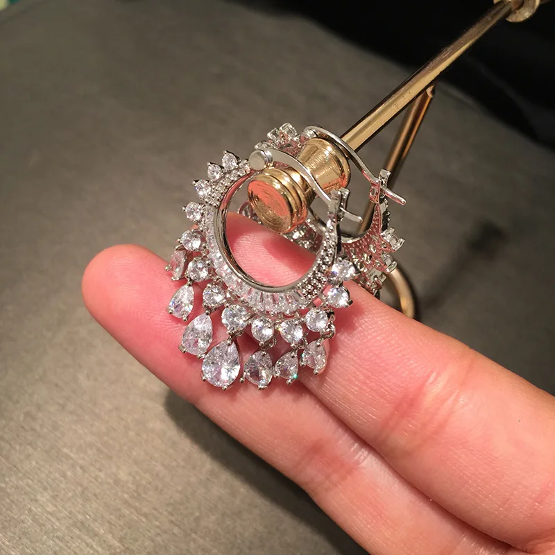 

European and American big-name circle earrings drop tassel spike super flash micro inlaid zircon luxury elegant ear buckle