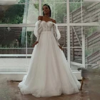 Женское платье с открытыми плечами и длинными рукавами