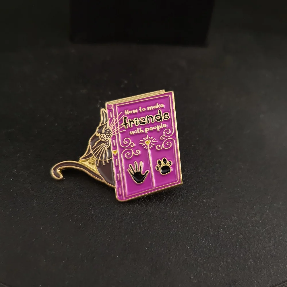 

QIHE JEWELRY Animal Book pin How to Make Friends With People brooches Lapel pins Cartoon Cat brooches Gift for Friends