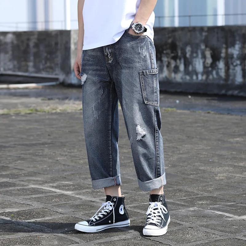 

Heren Jeans Men New Korean Modis Plus Size Men Broken Hole Erkek Jean Pantolon Loose Nine Pants Folded Legs Jeans Strappati Uomo