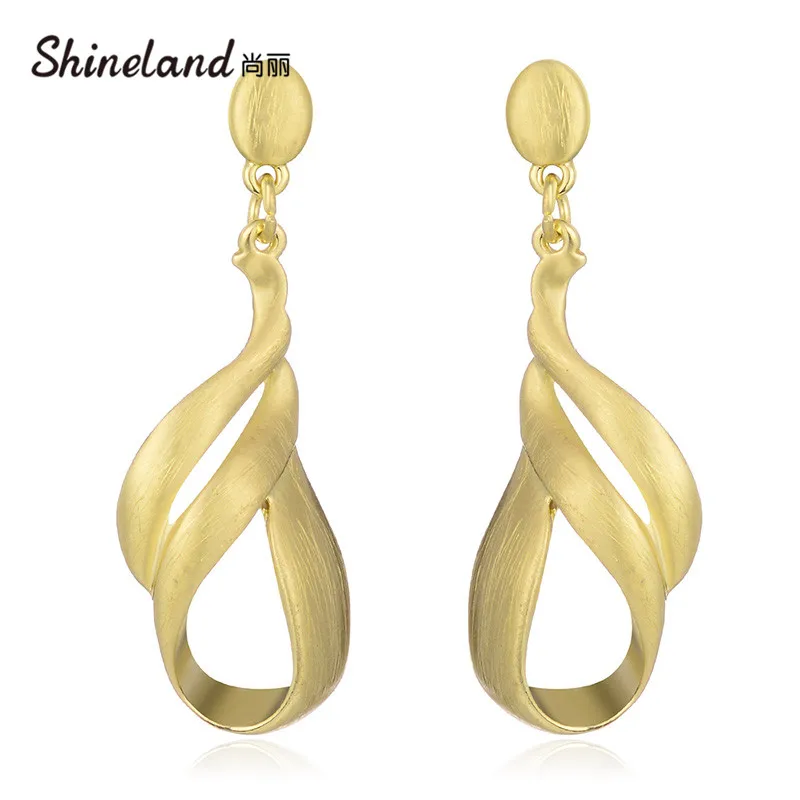 Женские сережки подвески Shineland вечерние в стиле панк с металлическим украшением