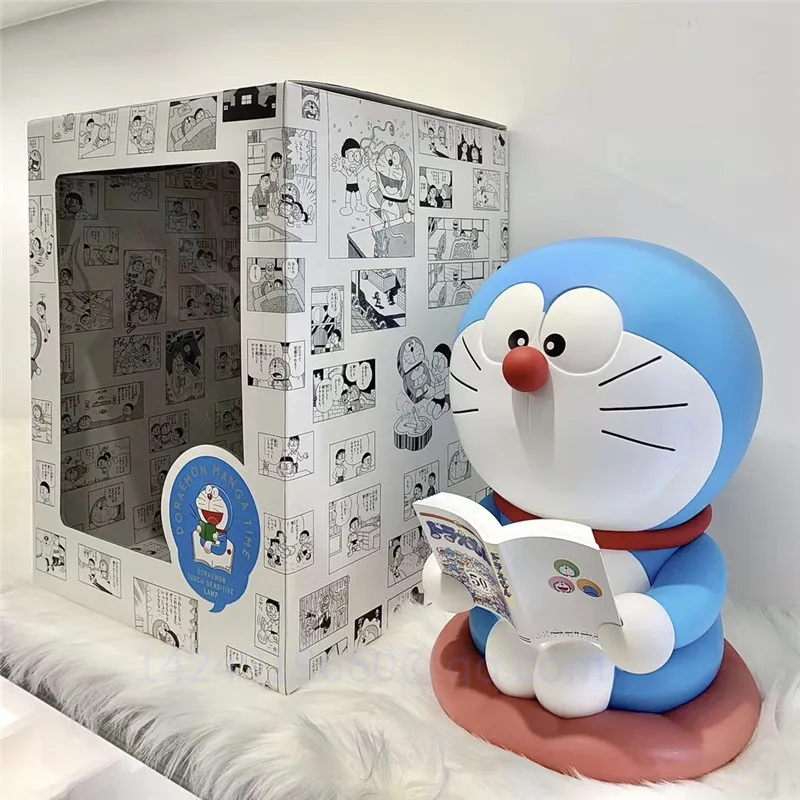 

Anime GK Statue Doraemon Read Comic Books Jingle Cats Nobita Nobi LED Resin Action Figure Model Collectible Gift Toy 38CM R528
