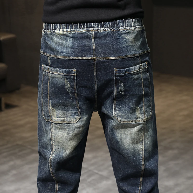 

Autumn Relaxed Tapered Jeans Men Streetwear Hiphop Elastic Waist Joggers Jeans Pants Man Casaul Denm Pants Front Pockets 42