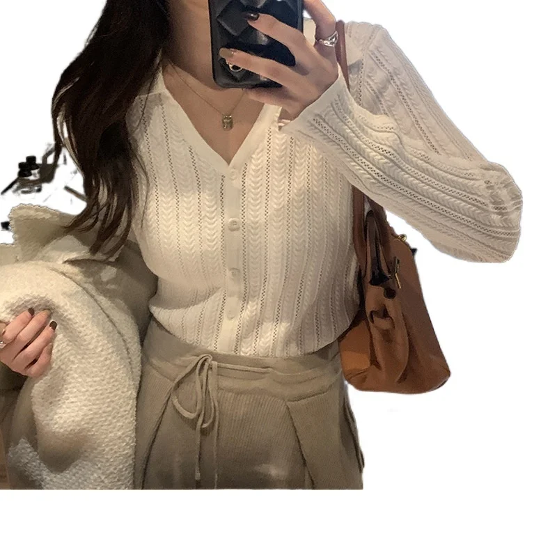 

knitted bottoming shirt women's autumn dress winter new Korean V-neck hollow cardigan thin slim white top Favourite Hot Sale