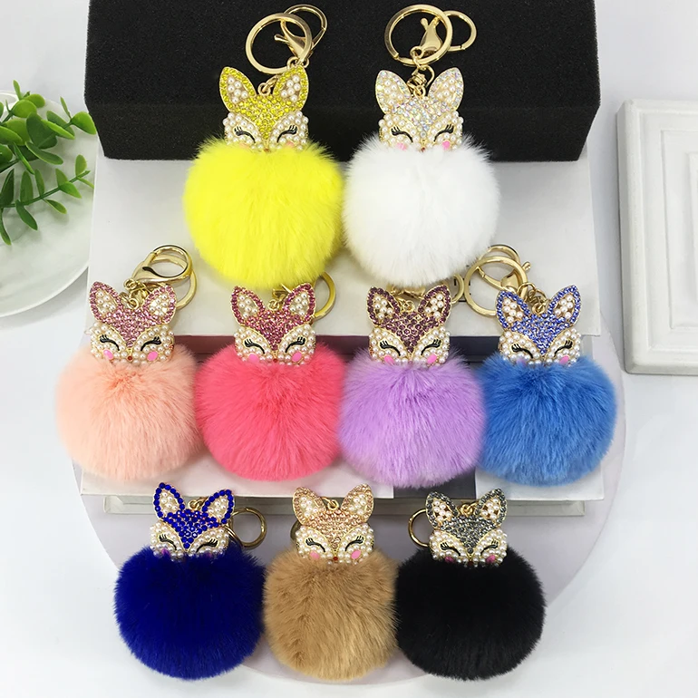 

Home delivery alloy pearl rhinestone animal head hair ball key ring pendant women's bag accessories
