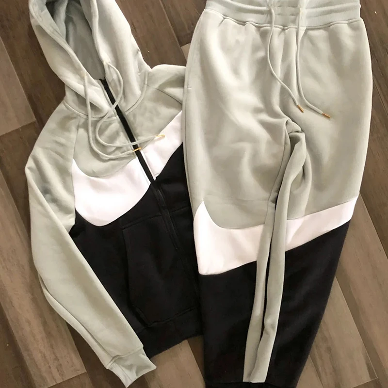 

2021 spring and autumn best selling sports casual wear hooded sweater stitching color zipper tether two-piece suit men clothing