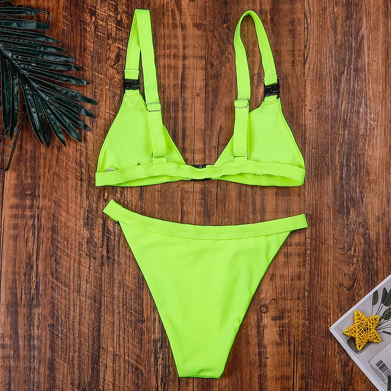 

2021 new European and American fashion sexy buckle lace-up swimsuit solid color split