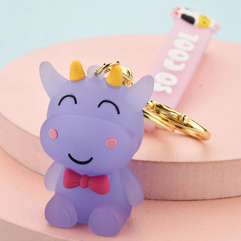 

2021 Year Cartoon Lucency Cow Doll Keychain Lovely Lucky Cow Lovers Car Key Chain Girl Bag Pendant Accessories Metal Keyring Hot
