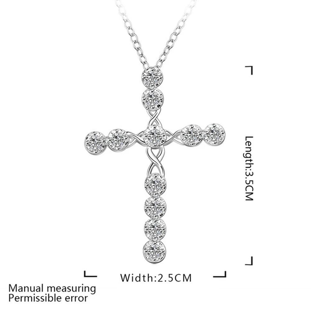 Женское ожерелье с крестиком из белого золота кристаллами в виде цветов и