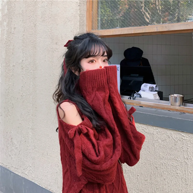 

is a lazy wind Christmas red sweater design feeling female niche qiu dong outfit that show a shoulder loose outer wear