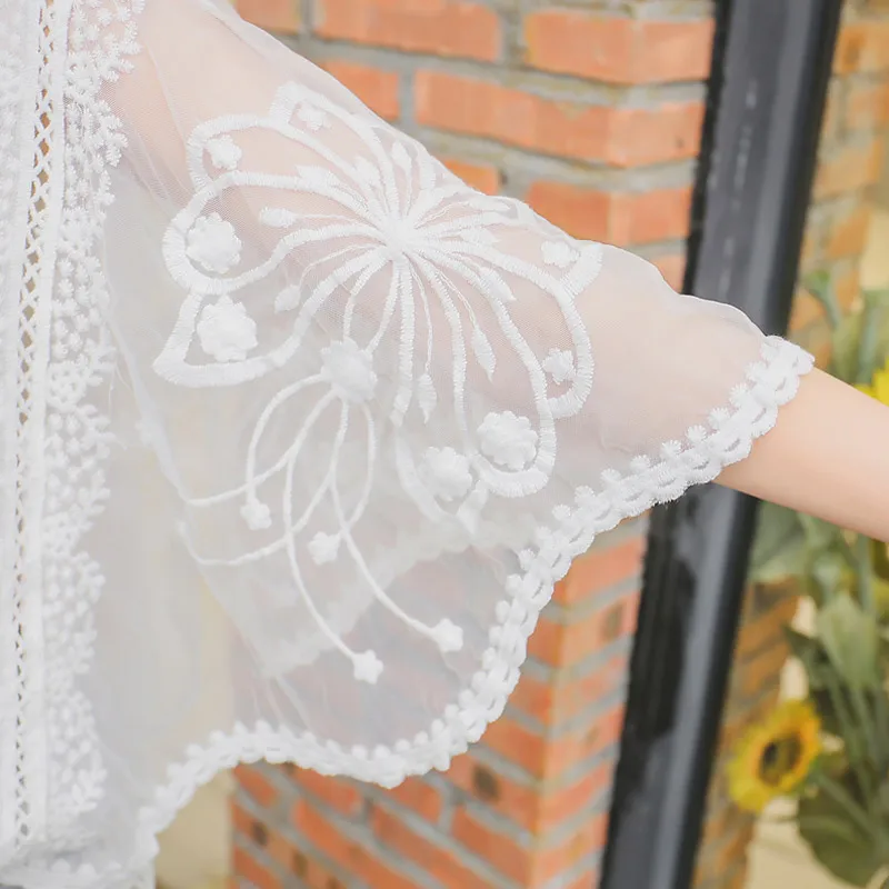 

Korean Elegant V-neck Lace Embroidered Crochet White Blouse Women Crop Tops Raglan Sleeves Hollow Out Sexy Summer Top 2020