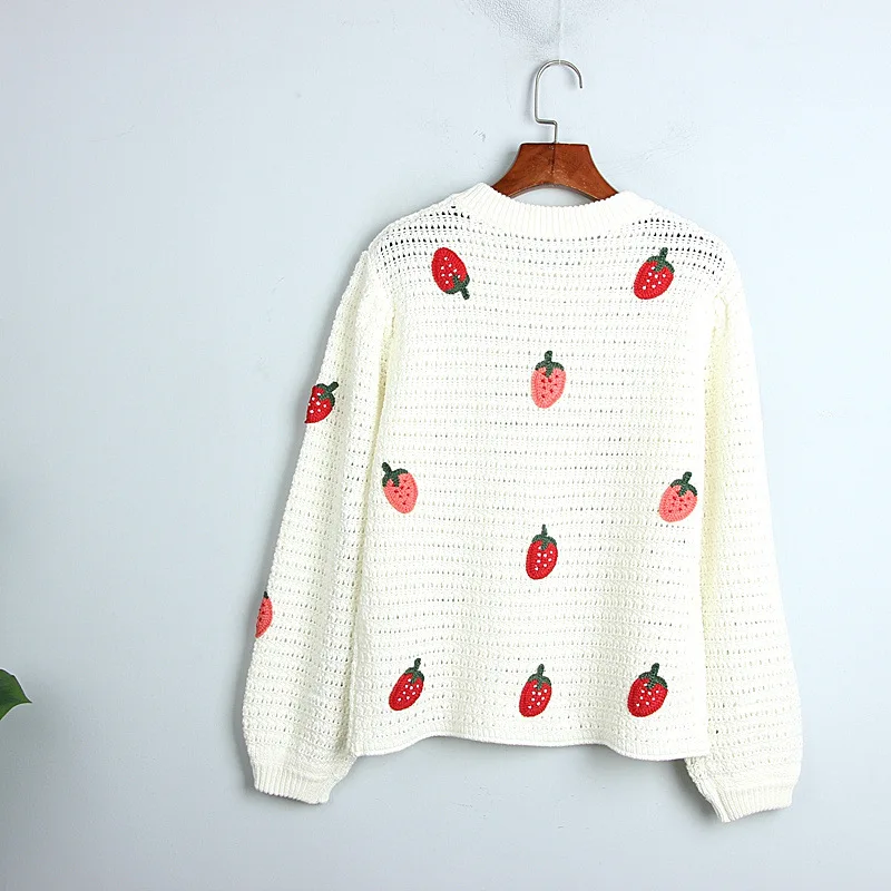 

Women's sweater thick thick needle autumn and winter new sweet hand hook strawberry hollow lantern sleeve