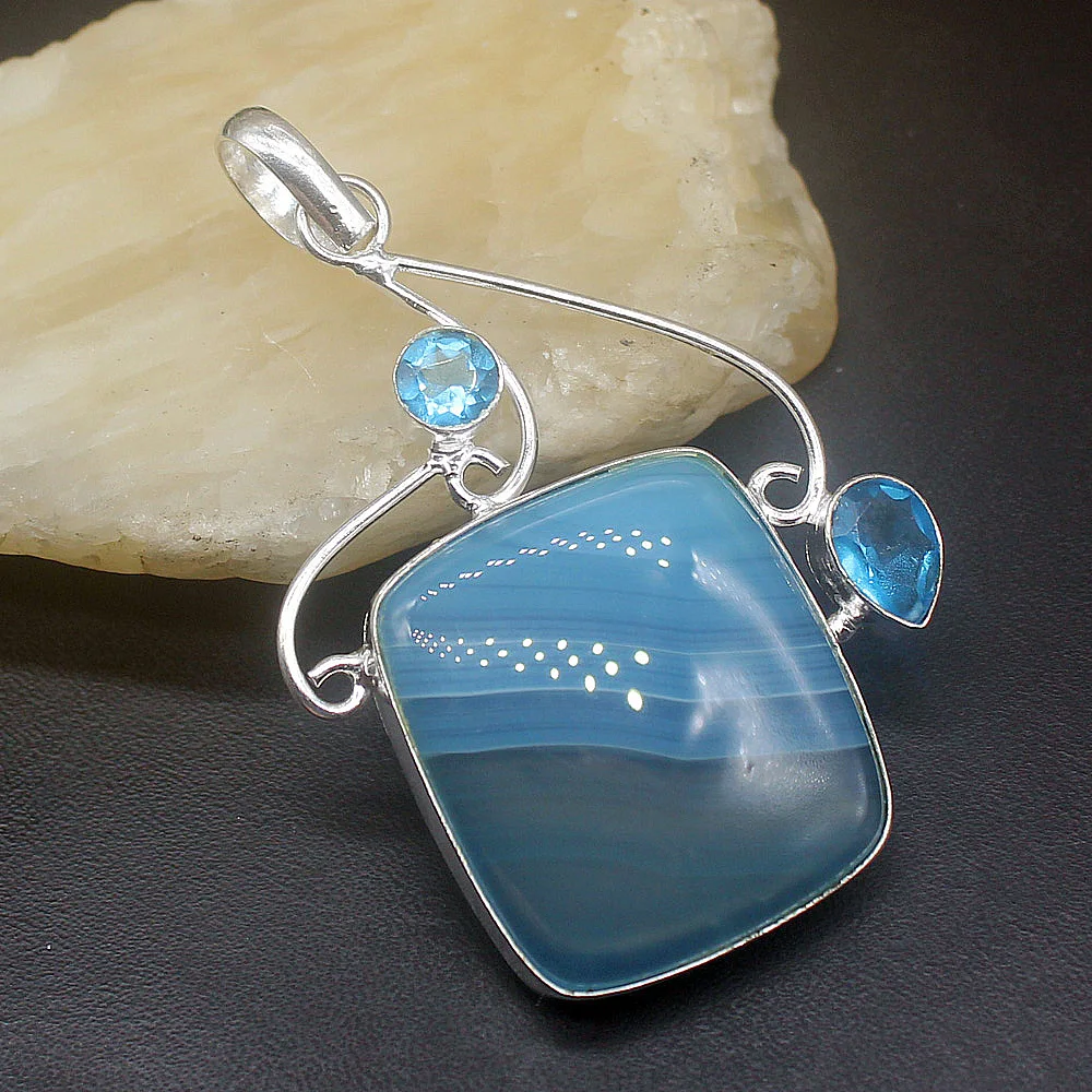 

Hermosa Jewelry Blue BotswanaAgate Shiny Topazz Silver Color Charm Fashion Necklace Pendant for Women Gifts 62mm FQ44