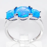 women brass oval simulated blue opal ladies ring