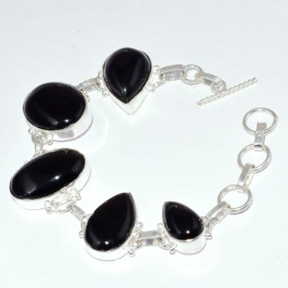 

Black Onyx Bracelet Silver Overlay over Copper , 20.2 cm, B3561