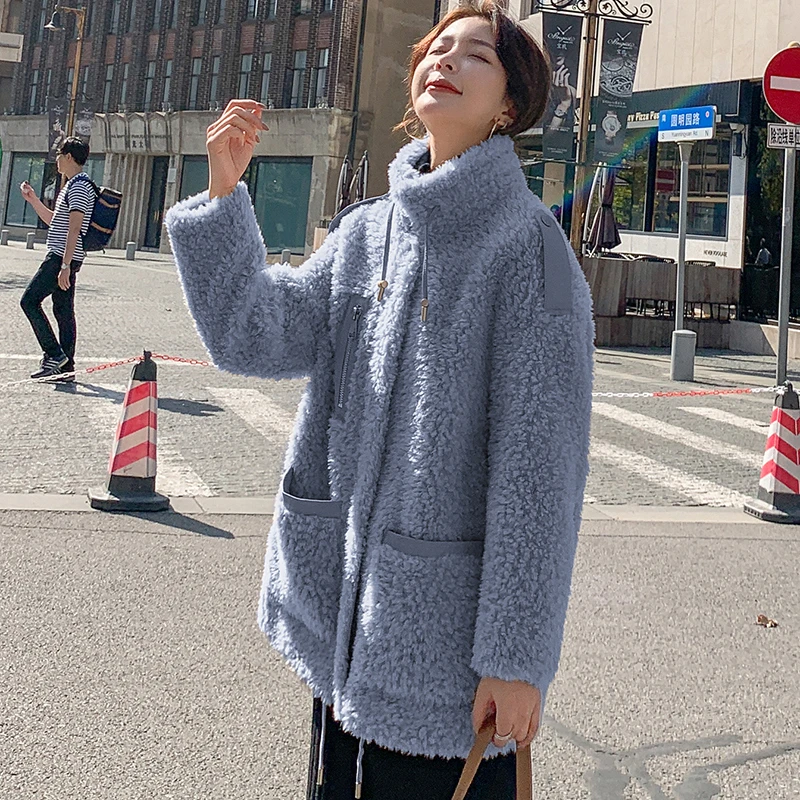 

Unua amo Winter Fleece Jacket Female Thick Warm Fluff Overcoat 2021 Fashion High Quality Faux Fur Lambswool Coat Women YY088A