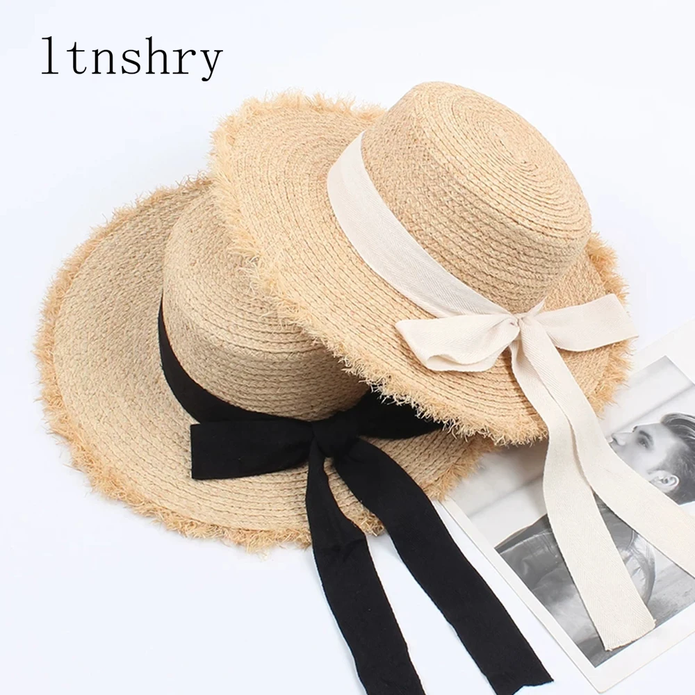 

2019 New summer sun hat bow 100%Raffia hat Visor Temperament flat Straw hats Women's Sea beach vacation leisure sunscreen hat