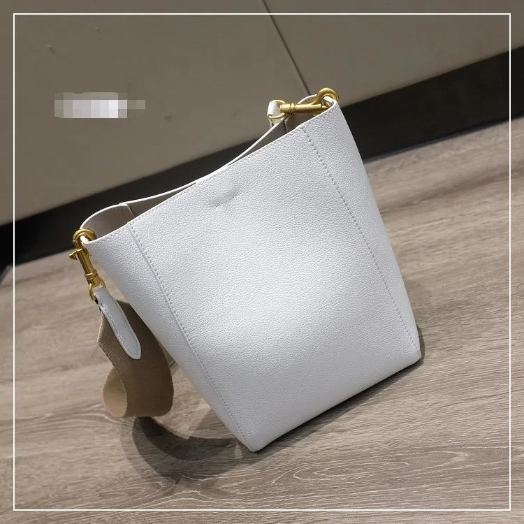 

2021women bagTop leather tote bag simple wide shoulder belt bucket bag commuting bag single shoulder hand bag for women