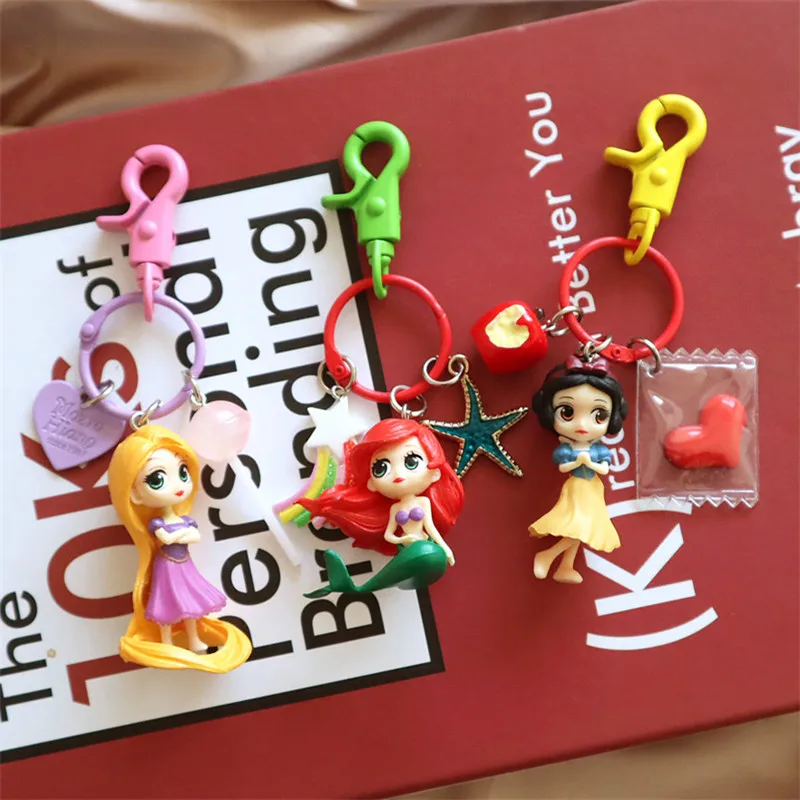 

Disney Keychian Cute Princess Snow White Keychain Toys Ariel Rapunzel Cartoon Mulan Keychains for Bags Girls Birthday Gifts Toys