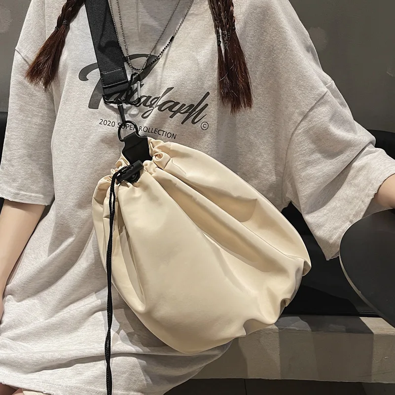 

Korean Version of Women's Pleated Shoulder Strap Drawstring Bucket Bag 2021 New Large Capacity Nylon Chest Bag Messenger Bag