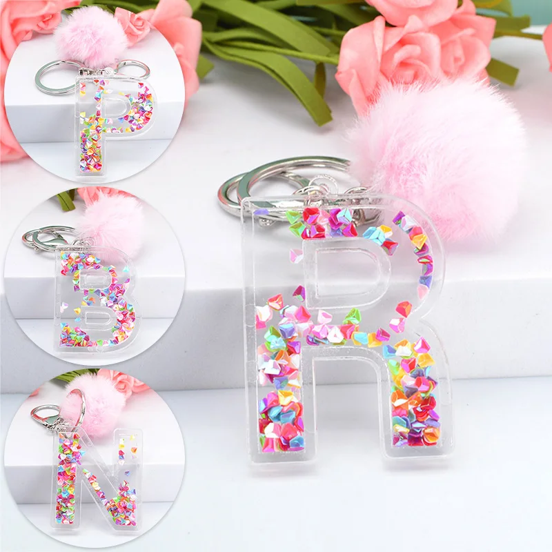 

1PCS Women's Fashion New Acrylic Hollow Letter Keychain 26 English Key Chains Ladies Bag Car Sequin Hair Ball Ornaments S78