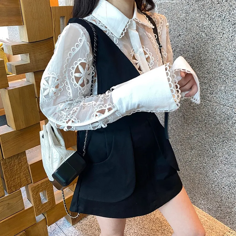 

High Quality Hollow Out Floral Embroidery Temperament Shirt Women Sexy See Through Long Sleeve Loose White Blouse Top 2020 Trend