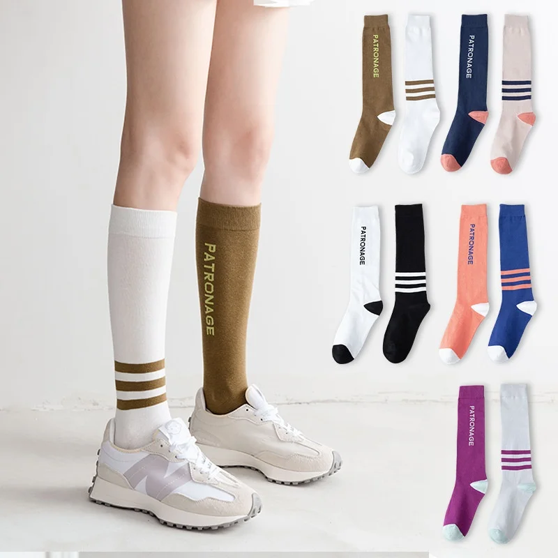

Autumn and winter fashion calf socks ins Japanese fashion letter football socks men's and women's lovers stockings