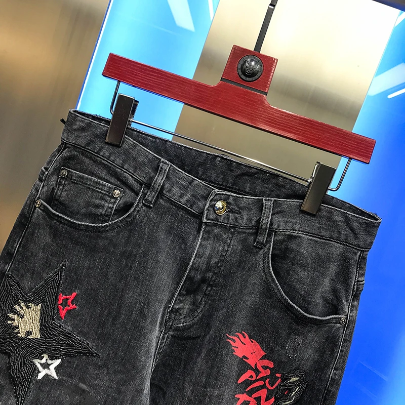 

2020 autumn men's new jeans star embroidery Beaded elastic simple Leggings youth black casual versatile mid waist handsome pants