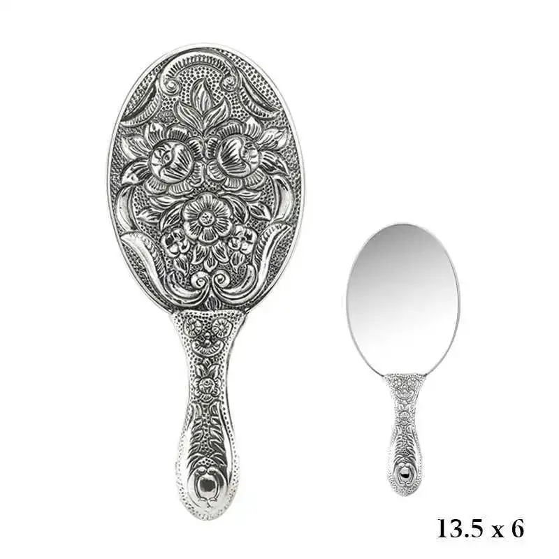 

Magnolia Motif Silver Hand Mirror