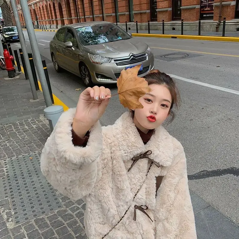 

woman jackets lose sweet bowknot thick fur coat Western-style horn buckle woman plus velvet thickening student warm women top