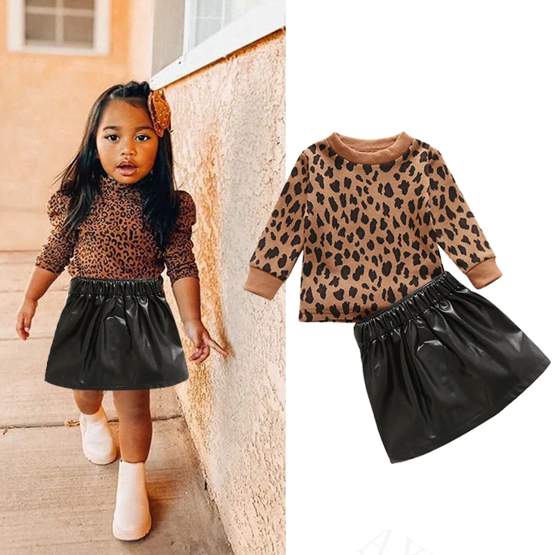 

Baby girl clothing suit 2021 new 1-5 year old girl long sleeve leopard print Pullover Top + A-line leather skirt suit