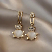 925 silver needle korean east gate fashion net red temperament design cats eye stone diamond inlaid bear earrings female