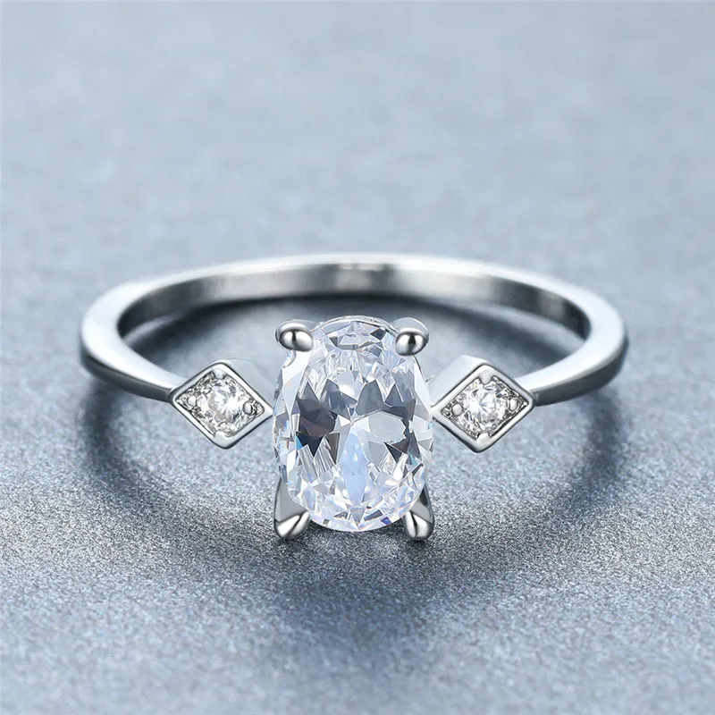 

Charm Female Blue White Crystal Thin Ring Dainty Zircon Silver Color Wedding Rings For Women Cute Oval Zircon Engagement Jewelry