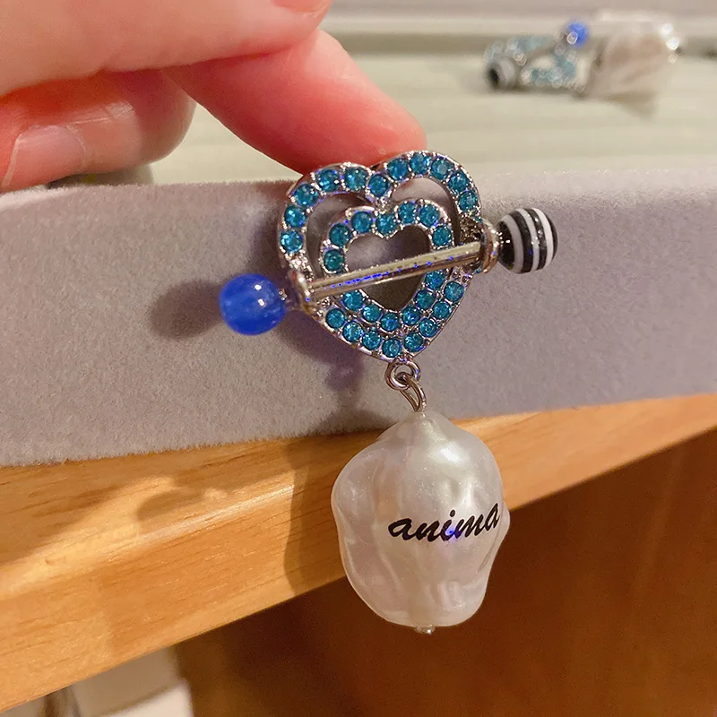 

Italian designer imitation baroque pearls irregular hollow love heart shiny blue rhinestone personality trend girls earrings