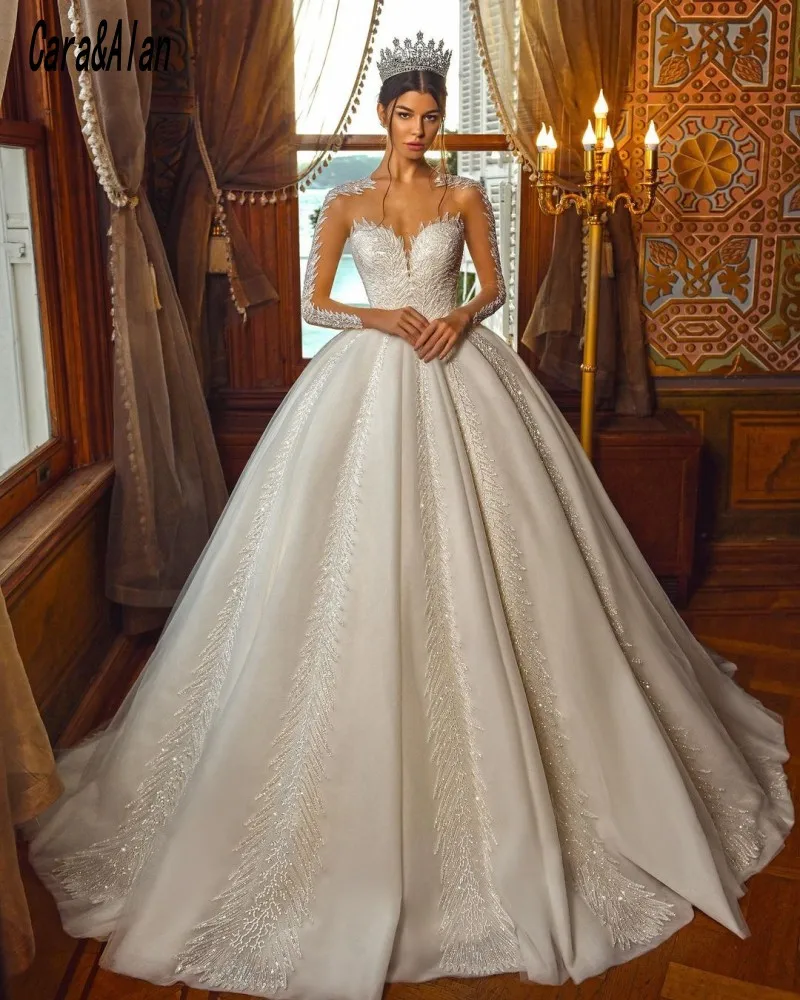 

Elegant Arabic Dubai Wedding Dresses 2021 Sheer Neck Applique Undefined Bridal Gowns Long Sleeves Robe De Soirée De Mariage