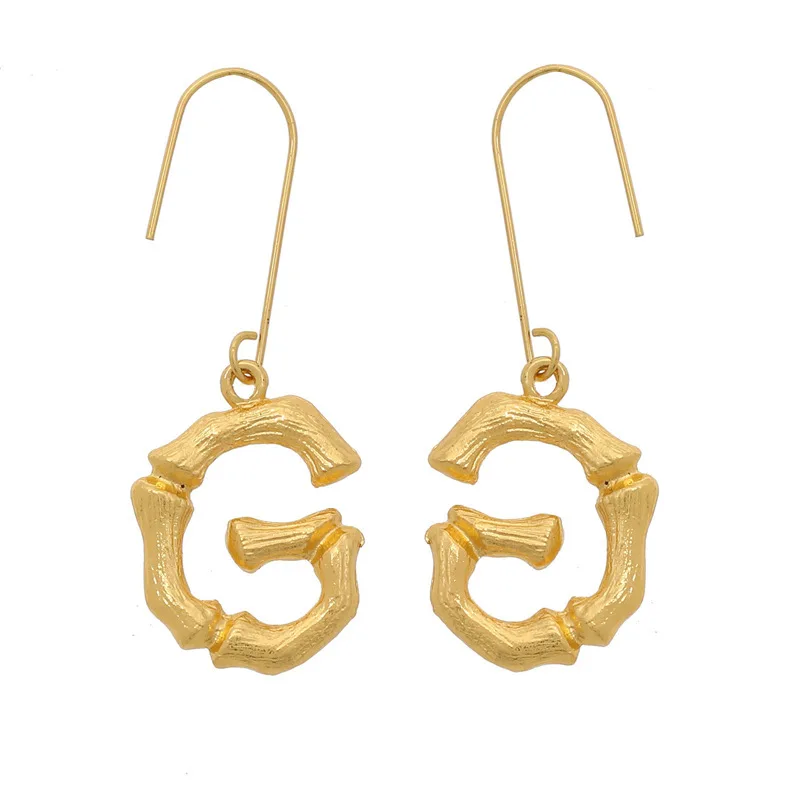 

2020 new European and American exaggerated fashion women 26 English alphabet earrings English catwalk models creative personalit