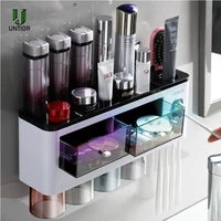 untior 2021 new bathroom accessories toothbrush holder with cups automatic toothpaste squeezer bathroom organizer storage rack